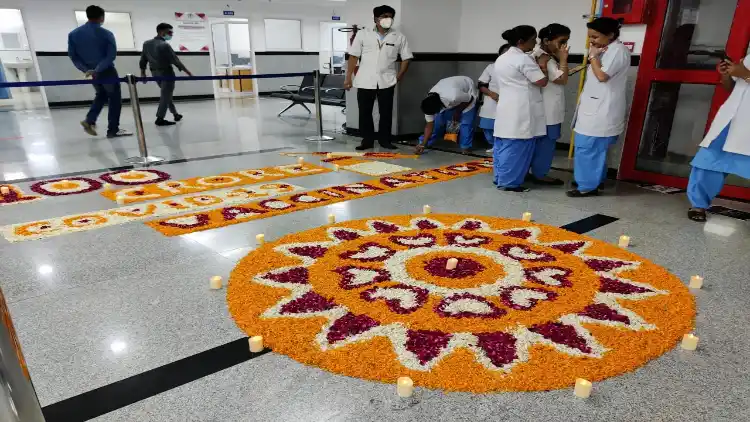 Doctors and staff at AIIMS, New Delhi, celebrates the 100 cr vaccination landmark 