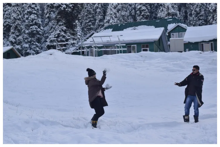 Famous ski resort of Gulmarg in north Kashmir was abuzz with tourists who  had come from various parts of India were mesmerized to cherish the live snowfall
