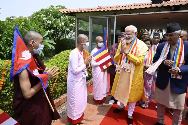Prime Minister Narendra Modi being welcomed by Buddhist monks at Lumbini temple