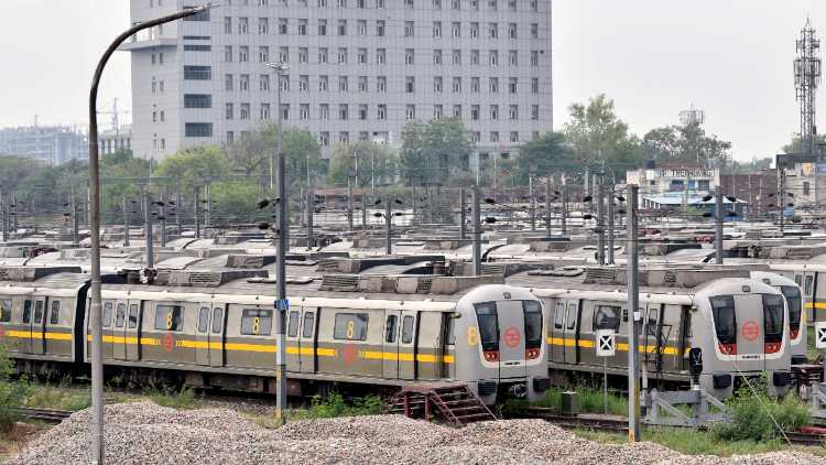 Metro trains parked at a yard as Metro services are suspended during lockdown in Delhi