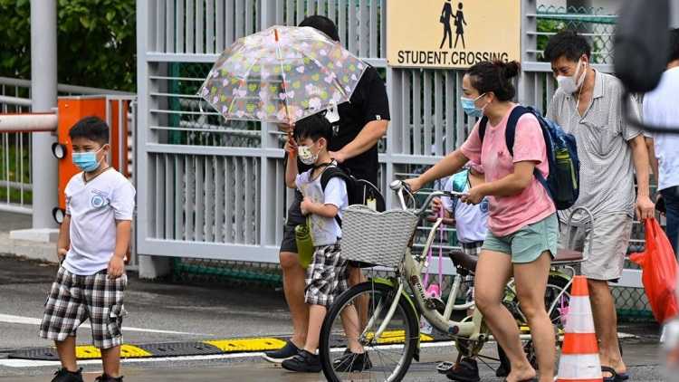 Singapore shuts schools amid new variant fears
