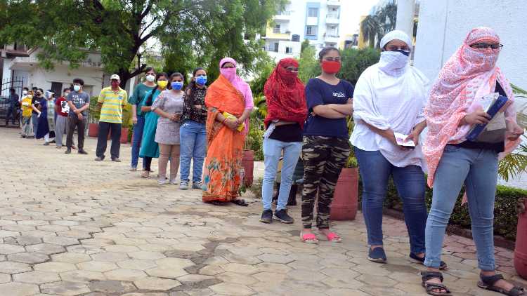 People in a queue to receive COVID19 vaccine in Bhopal