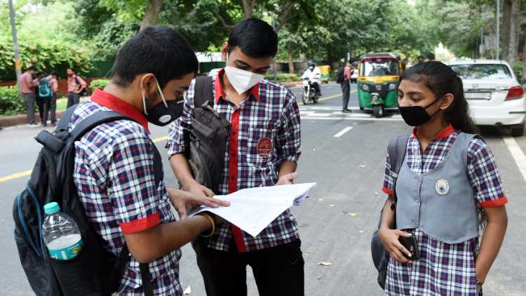 Students revising outside a school during the CBSE compartment examination, in New Delhi on Sep. 22 last year