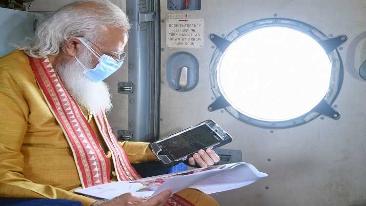 Prime Minister Narendra Modi conducts an aerial survey of areas of Odisha affected by Cyclone Yaas on May 28