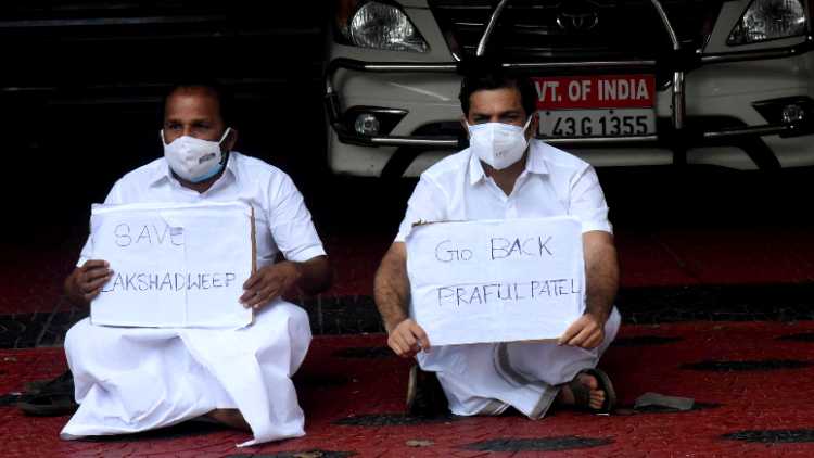 MPs Hibi Eden and TN Prathapan protest, demanding the Indian president urgently call back administrator Praful Khoda Patel, in front of the Lakshadweep Administration office in Kochi on Wednesday
