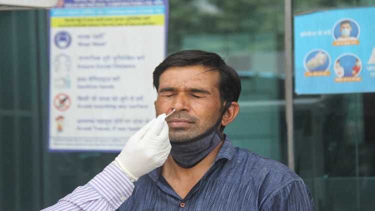  Health worker collect swab sample for Covid-19 testing 