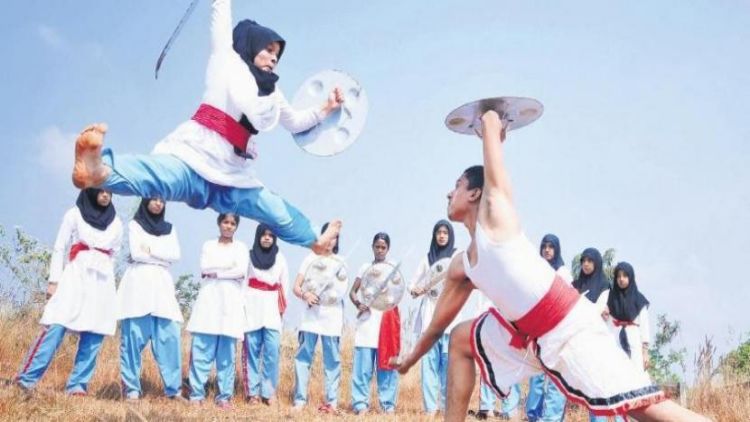 Arfa training others in Kalaripayattu