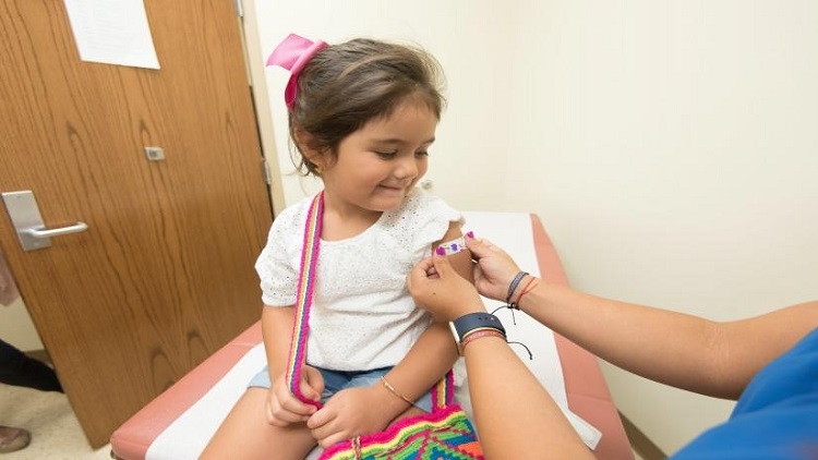 Safeguarding children from future waves with vaccination.