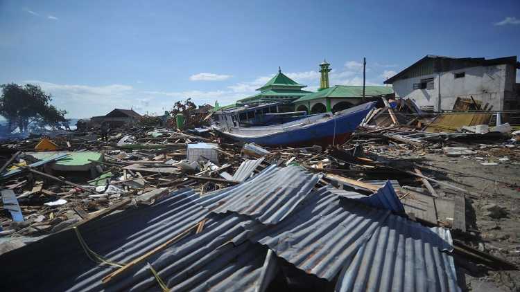 A stranded wooden boat is seen after an earthquake