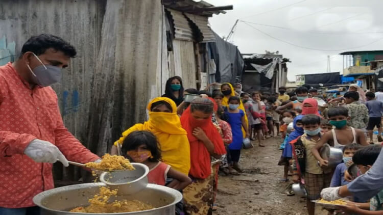 Faiyyaz Sheikh feeding the locals in Mulad