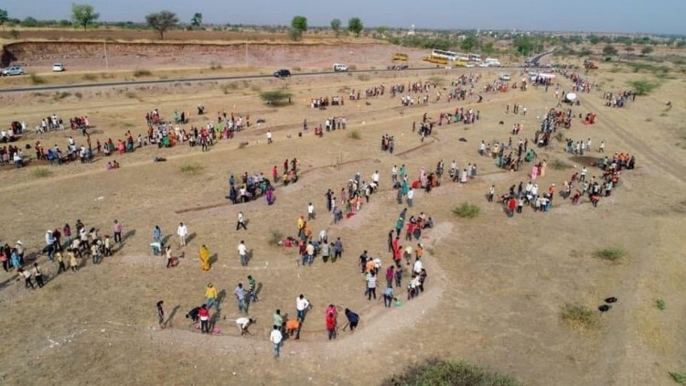 The villagers at work