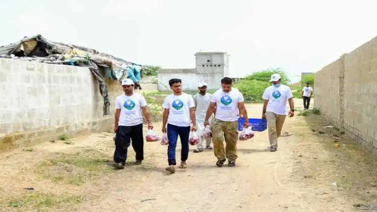 Young Muslim men distributing meat in poor areas (File)