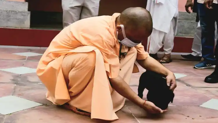 Yogi Aditya Nath fondling his pet Gullu