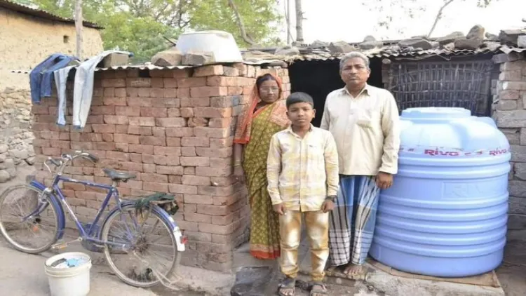Mateen with his parents outside their shanty