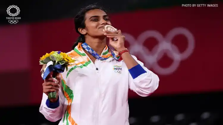 PV Sindhu kises her medal