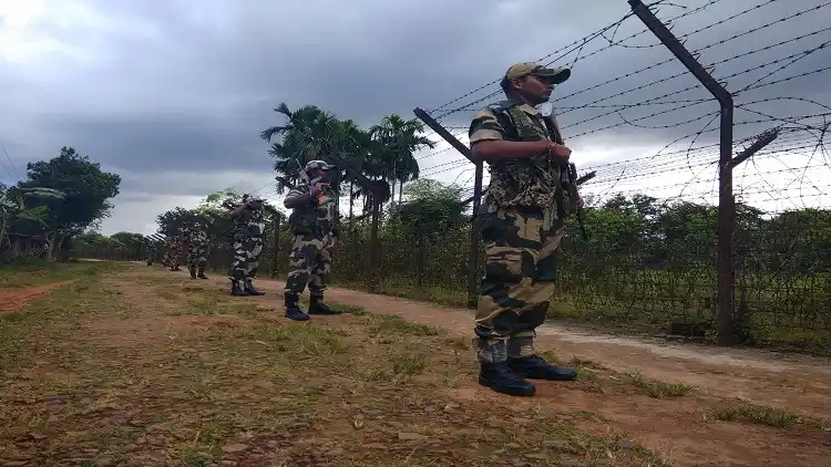 Border Security Force troopers guard India's border with Bangladesh