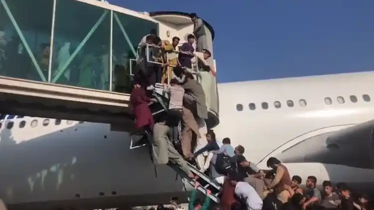 Chaos at Kabul airport to board flights