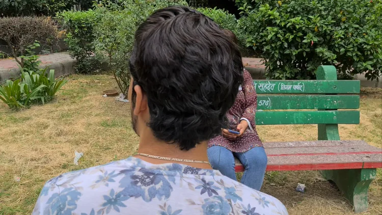 Marwah and Firdaus sitting in a park of Lajpat Nagar