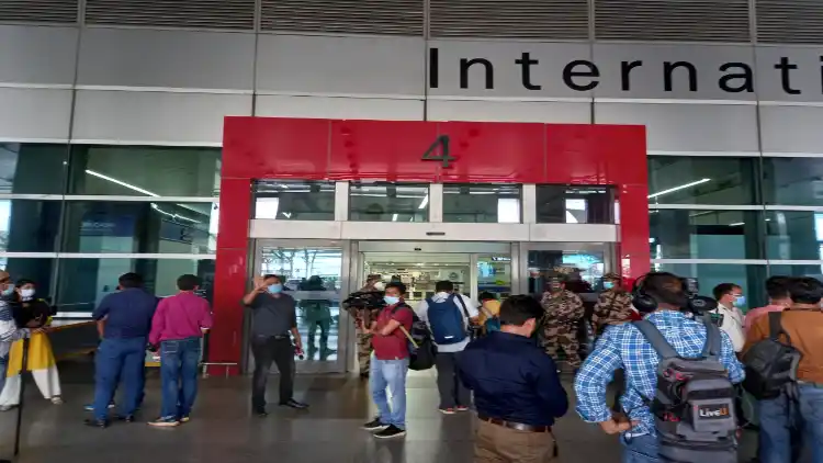 Media persons waiting at IGIA for the passengers flying from Kabul
