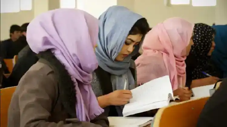 University students attend a class at Bamiyan University, Afghanistan