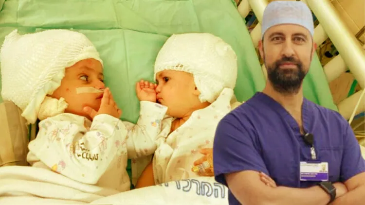  Dr. Noor ul Owase Jeelani with the separated twins after the surgery (Twitter)