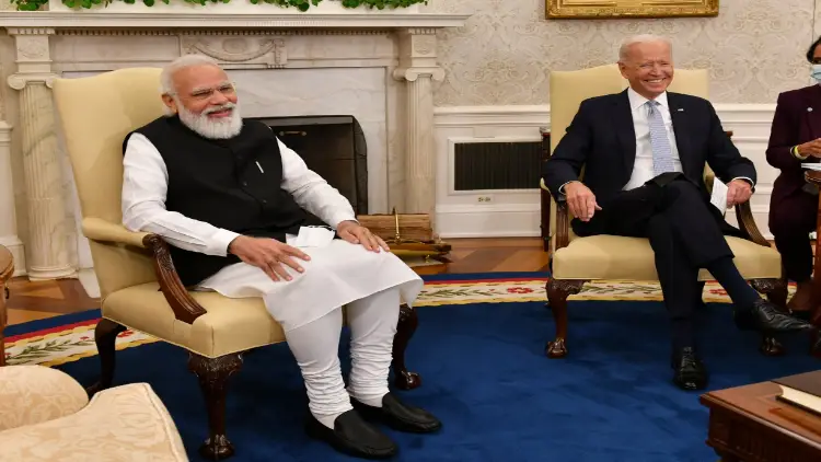 Presuident Joe Biden and PM Narendra Modi sharing a lighter moment at the meeting