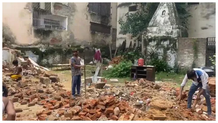 Scene of Dharamshala being demolished