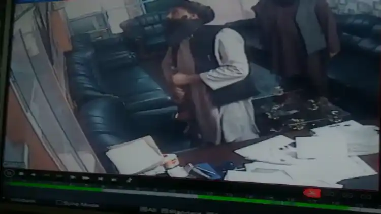 Video grab of the armed gunmen inside Kabul Gurudwara
