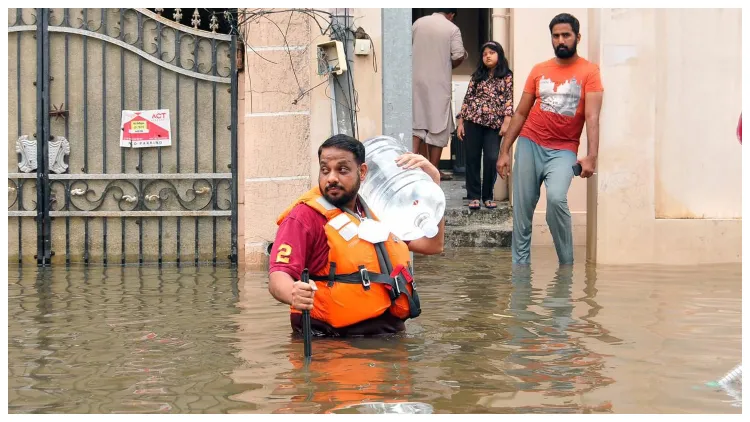 Mohammad Asif Hussain serving people during floods (Photo: Mohd. Akram)
