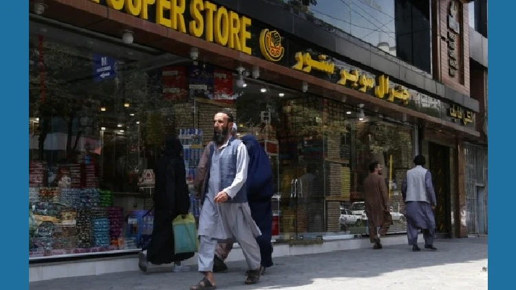 People walk on the street in Kabul, capital of Afghanistan