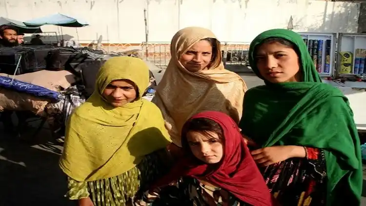 Afghan girls pose for photos in Kabul
