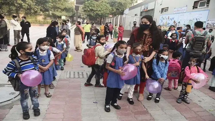 Parents and Students waiting outside the gate to maintain social distancing