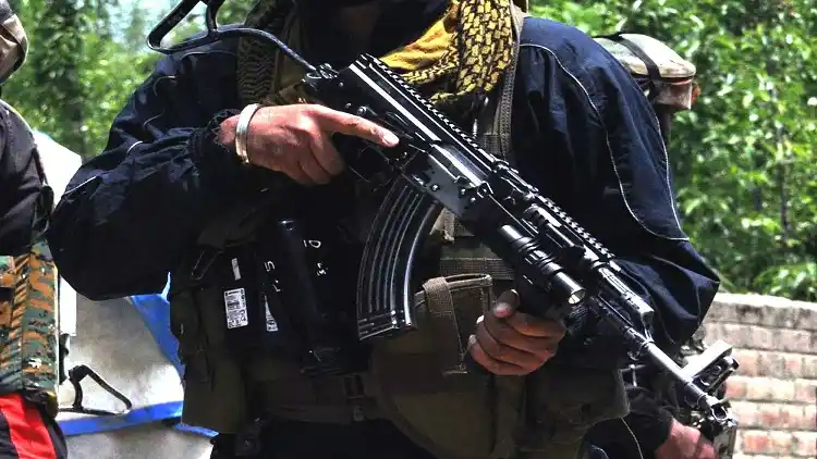 A soldier holding a gun in Jammu and Kashmir