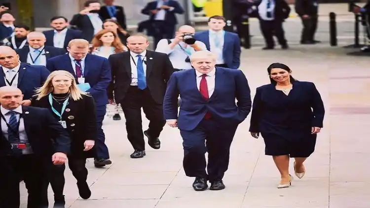 British home secretary Priti Patel and Prime Minister Boris Johnson.