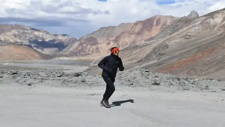 Safiya amidst mountains and one the run