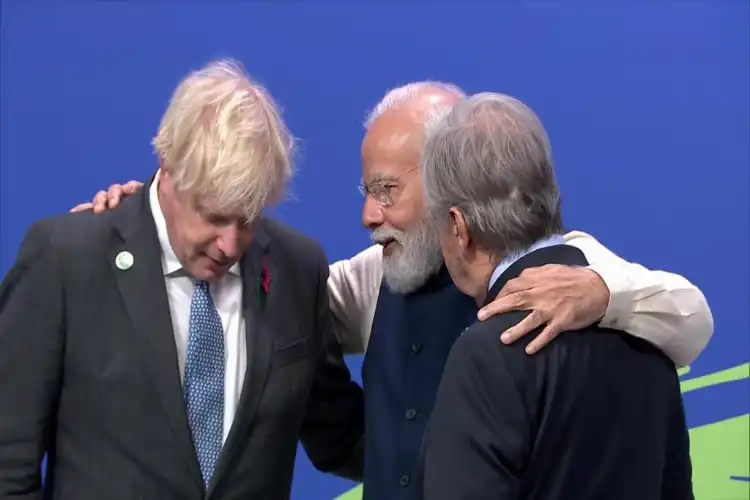 Prime Minister Narendra Modi discussing issues with Boris Johnson and the UN chief António Guterres (Image: MEA Twitter)