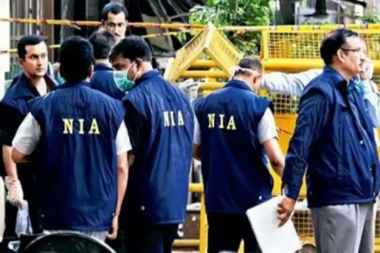 NIA Officials raiding a premises in Srinagar