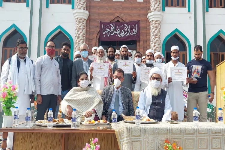 Ulema and clerics with district officers