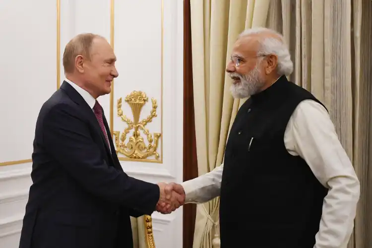 The handshake of friendship: Narendra Modi and Vladimir Putin before the Summit