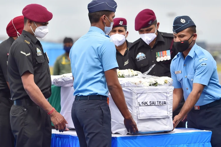 Army personnel carrying mortal remains of late Lance Naik Sai Teja at Yelahanka Air Base