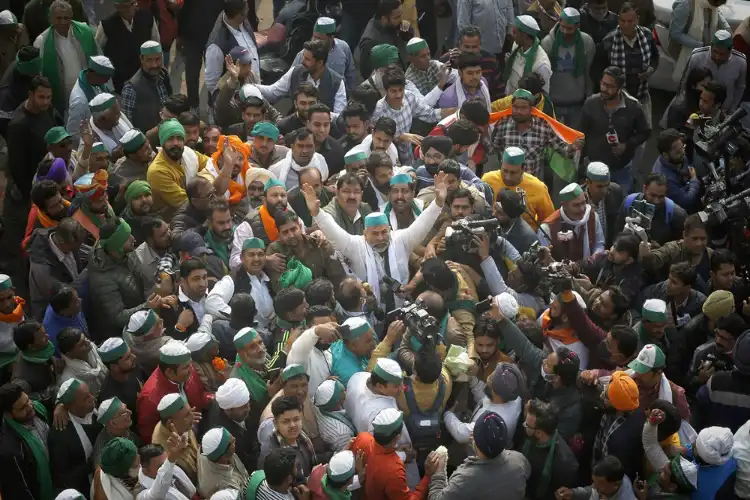 Rakesh Tikait celebrating farmers' victory