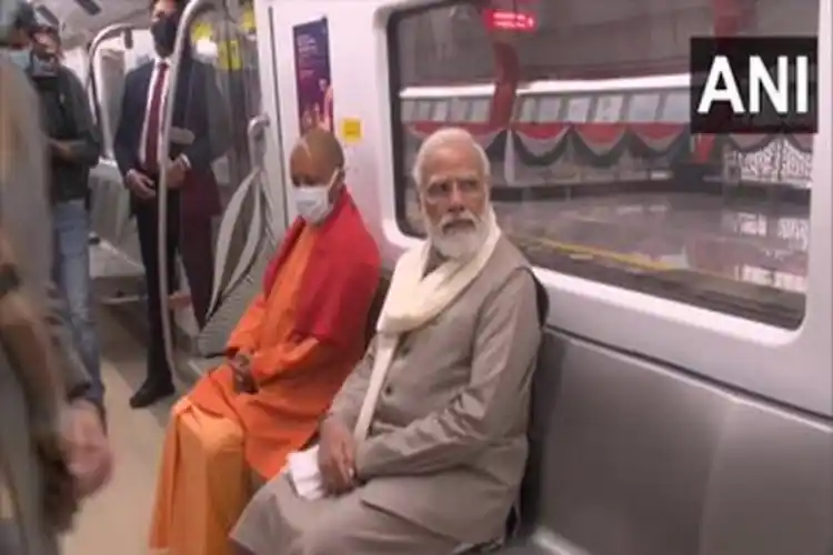 Prime Minister Narendra Modi and UP Chief Minister Adityanath take a ride in Kanpur Metro.