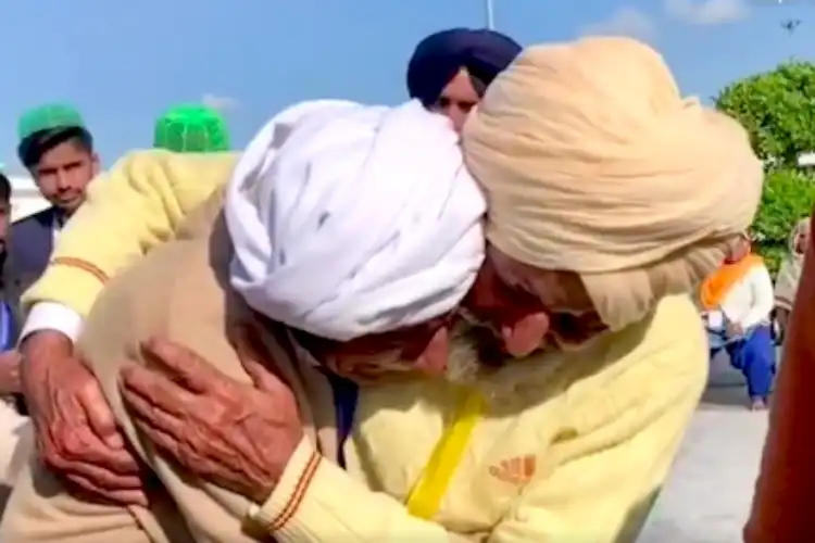 Mohammad Siddique and Habib hug each other (A video grab)