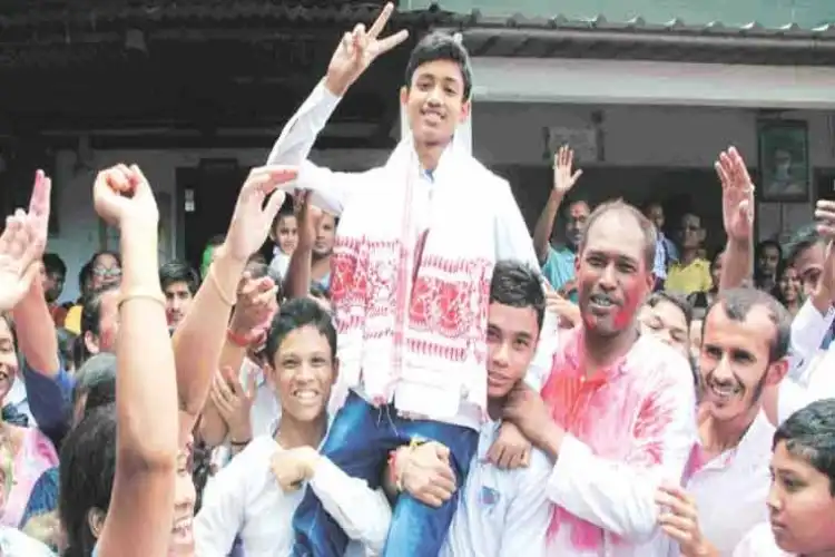 Muslim youth celebrating after school examination results (File pic)