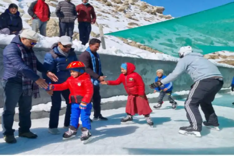 Young children playing ice skating at village Titichumik in Kargil