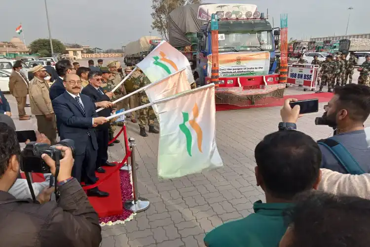 Foreign secretary Harsh Shringla and Afghanistan's ambassador to India Fareed Mamundzay flagging off the convoy carrying wheat to Afghanistan