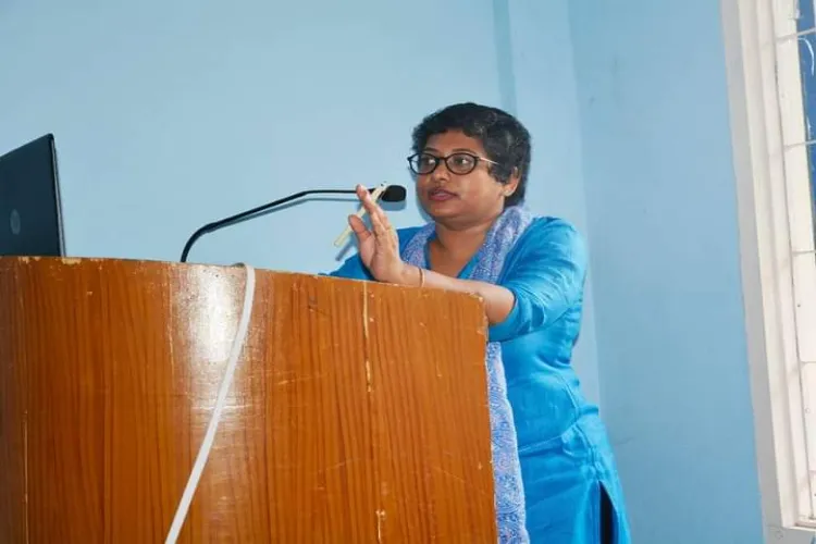 Runa rafique speaking at a seminar on livestock farming