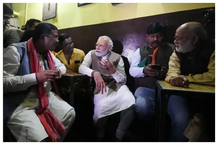 Prime Minister Narendra Modi drinking tea at Pappu Tea Stall, Varanasi