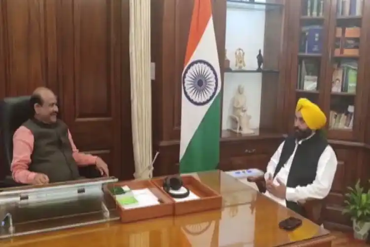 Punjab Chief Minister-designate Bhagwant Mann with Lok Sabha Speaker Om Birla.