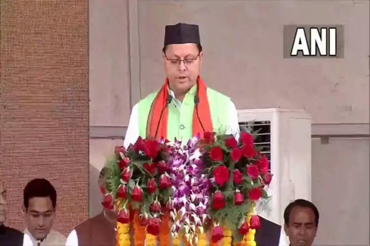 Pushkar Singh Dhami taking oath as Chief Minister of Uttarakhand.